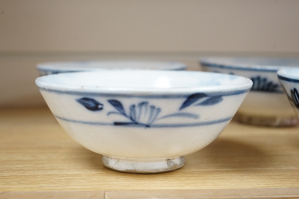 A set of four swatow blue and white pottery bowls, 17cm diameter. Condition - fair